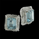These are a very fine set of 18kt white gold Aquamarine and diamond earrings. The earrings are a clip Circa 1950's Each earring is set with one 14mm x 12mm Aqua surrounded by Approx 5.0ct of full cut diamonds and baguettes dimonds. VS F-G quality. The over all size is 21mm x 19mm. 