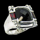 A black onyx and rhodonite sterling silver ring. The weight of the black onyx is 8.45ctw. and  for the rhodonite it is 2.10ctw. Bellarri's signature "B" is made of 18K gold with 2 diamonds in the center.