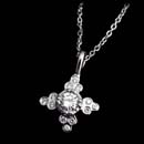 Cathy Carmendy's platinum flower pendant with .40ctw of full cut diamonds.