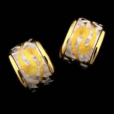 A wonderful pair of 18kt, 24kt, and platinum mini swirl impressionist hoop earrings from Michael Bondanza.