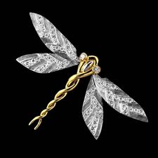 An exotic 18kt gold and platinum dragonfly pin from Michael Bondanza, set with .70ctw of diamonds.