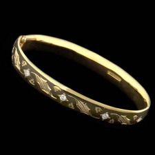 A very fine handmade diamond and 18kt gold bracelet. This Charles Greenn piece is hand-engraved.