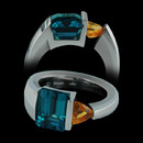 Contrasting hues: Steven Kretchmer makes use of contrast with this ladies platinum ring set with blue Indicolite tourmaline and golden sapphire.  This ring was a international awarding design and one of a kind.  We can have Kretchmer make another on a special order basis only.  Really nice!!
