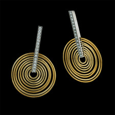 Eddie Sakamoto's beautiful spiral design. These platinum and 18kt yellow gold earrings contain .28ct total diamond weight.