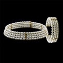 Classic 1960's set of pearl choker and cuff bracelet in 18kt gold by Mastaloni, NYC 14'' checker with 4 strands of pearls on a gold wire.  Bracelet will fit most 6 to 7 1/2 in wrists. Nice set!