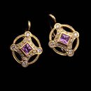 A marvelous pair of 20kt gold drop dangle earring by Cathy Carmendy. These earring have pink sapphire centers earrings with fine diamond accents at the four corners. The earrings have a lever backs. and flow well when worn. 