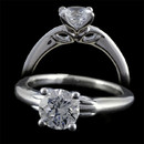 An 18 karat white gold solitaire engagement ring with that distinctive Harout R styling. The ring features a 1.00 carat diamond center, but can accommodate diamonds from 0.50 carats and up. The ring measures 2.6mm in width. This ring is also available in platinum. The pricing does not include the center diamond.