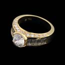 A ladies 18kt yellow gold round and baguette diamond Captiva engagement ring. This Gumuchian ring is 7.5mm wide and contains 1.57ctw of diamonds. This can be made with prongs.  Center diamond not included.