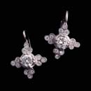 Platinum diamond set flower earrings with .75ctw. in diamonds.
