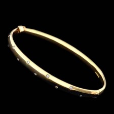 A classic diamond-set bracelet from Charles Green in 18kt yellow gold. The bracelet is set with .22ct of diamonds.