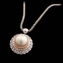 18kt white gold pendant and necklace with an 8.5mm golden pearl and .46cts of diamonds