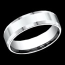 A stylish 14k white gold 6mm comfort-fit high polished carved design band features a slight beveled edge for a classic look. This ring is priced at a size 10, but can be made in other sizes. Price may vary depending on finger size.