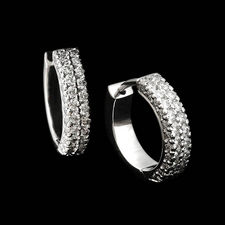 Michael B.'s platinum double row flat band huggie diamond earrings. The earrings contain 90 diamonds weighing .62ct total.  These beautiful pieces measure 3mm in width and 13mm in height.