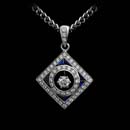This beautiful pendant shines with .27cts. in diamonds and .50cts. in sapphires.