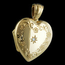 Show her the love and give her your heart with this Charles Green classic hand-engraved locket.  The locket is made in 18kt gold and set with a single .03ct diamond. This locket measures 23mm x 21mm.