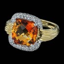 From the Faceted collection by Spark an 18 karat gold two tone ring. The ring is set with 0.43ct. carats of diamonds and a 4.05 carat Citrine. 