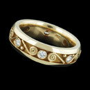 Item 103CO1 - A beautiful 18k yellow gold ring by Eli, featuring intricate wirework and innovative design. The ring is set with .32ct of diamonds. Ring size 6.5.