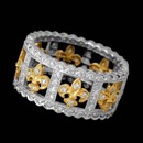 This regal platinum and 18k yellow gold Beverley K wedding ring shines with .73ctw in brilliant diamonds. This beautiful band measures 9.6mm in width. This ring features an 18k yellow gold Fleur Du Li design going around the band.