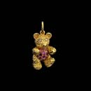 18kt. gold movable baby bear with pink sapphire tummy and diamond eyes. This piece is available in 7/8th inches.  Arms, legs, and head moves.  Just adorable.  Very solid pieces. Made in the USA