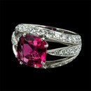 This 18kt white gold "Luna" ring by Gumuchian contains an amazing hot pink Rubelite weighing 3.23ct. and 2.64ct. total weight of pave' set diamonds. Diamonds are VVS F ideal.  This piece measures 13m across the top and the shank tapers to 5m for a very comfortable fit.
