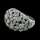 This platinum and diamond ring by Gumuchian will definitely put you on ''Cloud Nine''.  The piece contains 41 bezel set diamonds for a total weight of 5.70ct.  The diamonds are very brilliant and have the appearance of floating.  
