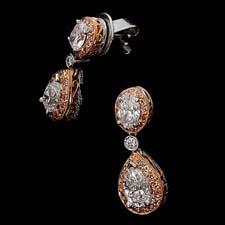 Designed by Michael Beaudry, these gorgeous fancy pink oval and pear-shaped earrings feature .91ctw in pear-shaped diamonds and .46ctw in fancy pink round brilliants. Call for price and availability.