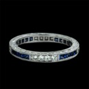 This is an absolutely stunning 18k diamond and sapphire eternity wedding band from Beverley K.  There are .67ctw of french cut blue sapphires and .31ctw of round diamonds in the band and there is a hand engraved design on the edges. This piece measures 2.5mm in width.