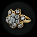 Item 122CO1 - 18kt yellow gold and platinum ring with 1.32ctw of beautiful diamonds. The thickness of the head of the ring is 16.5mmm with a size of 6.25.