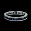 This is an amazing 18K sapphire Beverley K eternity wedding band.  The hand engraved ring has 2.33ctw of princess cut blue sapphires. The ring is 3.3mm wide. 