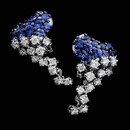 Damiani Earring 12F2: Blue luster: These elegant 18kt white gold diamond and blue sapphire cluster earrings from Damiani contain 1.22ctw in diamond and 2.20ctw in sapphires. Damiani Earring 12F2 jewelry