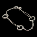 Damiani Bracelet 12F4: Co-designed by Damiani and Brad Pitt. This lovely 7 1/2inch D-Side bracelet is set with .21ctw of diamonds. Circles measure 12mm each. Damiani Bracelet 12F4 jewelry