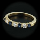 Item 137CO1 - This gorgeous Jeff Cooper 18kt yellow gold band is set with .34cts of sapphires and .21cts of diamonds. With a thickness of 3.5mm and a size of 6 3/8.
