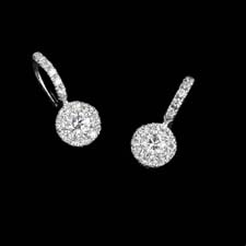 An exquisite pair of 18kt white gold earrings by Peter Storm. The set contains .66ct of diamonds and the cluster measures 7.2mm. Just Gorgeous!!!!