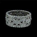 This beautiful Beverley K wide diamond eternity wedding ring is an 18K white gold stunner. The ring is set with 0.91 carats total weight of G/H color VS clarity diamonds.  The center of the ring has a pave' criss cross design with bezel set diamonds on either side of the center in  pretty scalloped edges. This band is 9mm wide. All edges are milgrained. This ring is also available in platinum. 