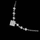 A classic diamond princess necklace.  This delicate design is set with .33ctw of diamonds. The necklace is in 18kt white gold and is 16 inches in length. The cluster measures 6.8mm.