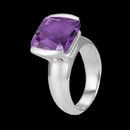 Elegant styling describes this ring from the Signature Collection by Metalsmiths Sterling. The ring is channel set with a rectangular shape brilliant cushion cut amethyst weighing approximately 9.0 carats. The ring measures 11.9mm across the top center. The ring is available in even sizes from 6 to 8. Also available in black onyx and blue topaz.  
