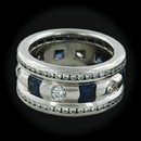 Item 152PO1 - This amazing Whitney Boin piece features 1.26cts of natural princess cut sapphires, and measures 9.5mm wide, with a finger size of 4.50. The diamonds, round cut and set between the sapphires and eternity in the outer band sections are F color VS clarity, and weigh 1.30cts. The piece is finished in high polish.