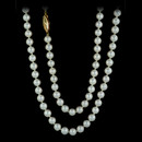 This matinee length strand of pearls at 24" features beautiful 6.50 mm pearls, finished in 18kt yellow gold pearl clasp. Notice the detail of the clasp, half textured, and half polished.
