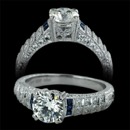 This Platinum engagement ring has small accent blue sapphires and 0.25 carats total weight of diamonds. The ring accommodates a 1.0 carat center diamond. The center stone not included. This ring is also available in 18 karat gold.