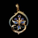 Gorgeous blue and green enamel floral pendant with .13ctw in diamonds from Nouveau Collection. Set in 18kt yellow gold. The pendant features 3 blue sapphires. A real beauty!