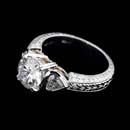 This one-of-a-kind Michael Beaudry engagement ring symbolizes the unique quality of love. The platinum diamond semi-mount blazes with two bezel set diamond hearts .44ct tw with 22k intricate yellow gold gallery work. This was a custom created piece, please call for comparison pricing information.