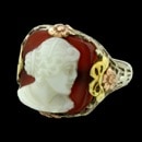 A really nice Antique pink, white and green 18k gold filigree cameo ring.  Hard to find piece for I have seen many cameo's but nothing like this.  Just plain beautiful and understated.  The ring is a size 5 1/2 and weighs 3.9 grams.  You will enjoy this piece.  All filigree intact with no repairs.  Tested for gold content.