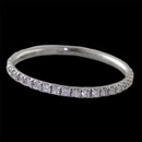 Our classic 18kt white gold "mini prong" set eternity ring. This is the full eternity design and is the best one made. Totally everyday. The ring is 1.4mm wide and perfect for stacking with other colored mini's or larger rings. .35ct of VS F-G ideal diamonds. Handmade in the USA 