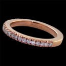 Our classic 18kt pink gold diamond band. This piece is set with .30ct of VS F-G ideal cut diamonds. The ring is 2.4mm in width. This method of manufacturing is the Swiss extrusion which make the ring the hardest available for everyday wear. Available in 18kt yellow and platinum. Made in the USA.