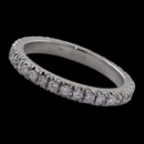 A 18kt white gold diamond eternity ring set with .40ct of VS F-G ideal cut diamonds. This all time classic has a 2.3mm width with a "cut down" setting allowing more light to reach the diamonds. Wear them everyday, they are timeless. Solid rings Swiss extrusion method of manufacturing and made in the USA. Available in yellow, pink, and platinum.