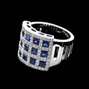 Damiani Ring 19F1: Blue knockout: This Damiani cocktail ring lights up with a patchwork of white gold diamonds and sapphires. 2.31ct combined total weight. Damiani Ring 19F1 jewelry