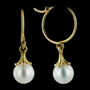 A lovely and classic pair of 18Kt yellow gold pearl drop earrings.  The pearl measures 6mm.  Also available with 9mm pearls and in platinum, call for pricing.  