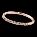 Our classic 18kt pink gold "mini prong" diamond band. The diamonds are set 1/2 way around this tough little ring. Wear everyday, stack with the other colors of "mini's" Wear with about any ring you wish. Perfect compliment. 1.4mm width. .20ct of VS F-G ideal cut diamonds. Made in the USA and the best made!
