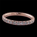 A beautiful and classic 18kt pink gold diamond wedding/stackable ring. The piece which is 2.3mm in width is set with .55ct of ideal cut VS+ F-G quality diamonds. The is the 3/4 diamond version. Great everyday ring and the finest setting job you will ever see. Available in 18kt white or yellow gold and platinum.  Made in the USA.