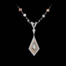 This beautiful platinum and 18k rose gold kite pendant by Beuadry shines with kite shaped and round diamonds. Call for price and availability.